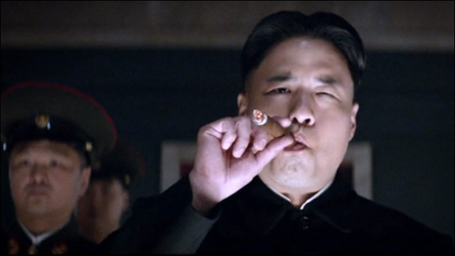 Randall Park smoking a cigarette (or weed)
