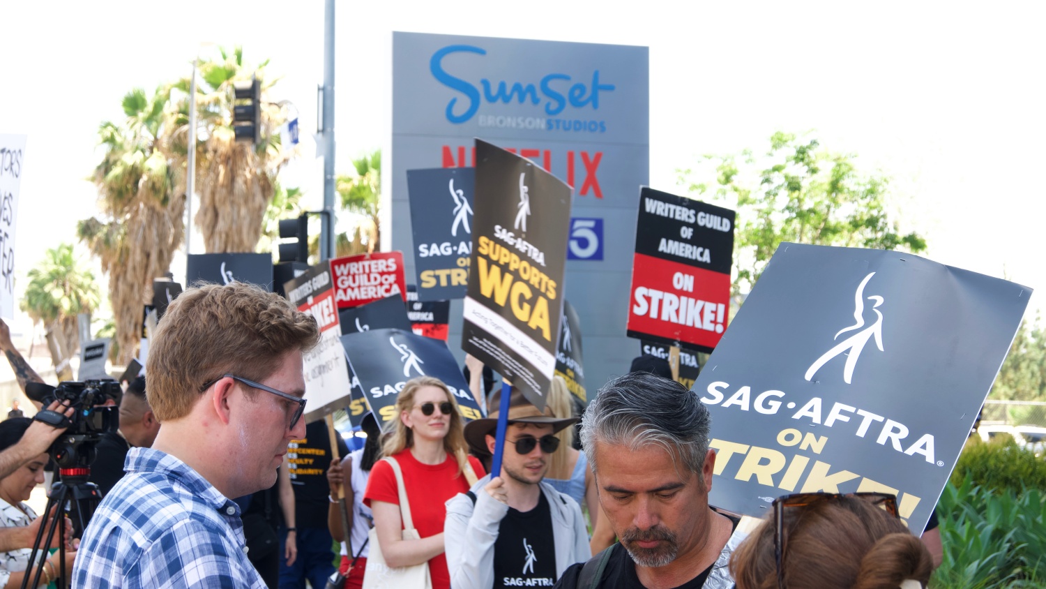 The WGA and SAG-AFTRA members participating in strikes against Hollywood studios.   