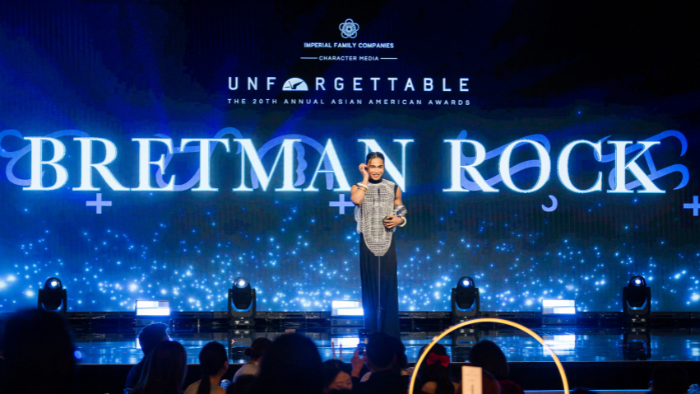 Bretman Rock receiving his award at the 20th annual Unforgettable Gala